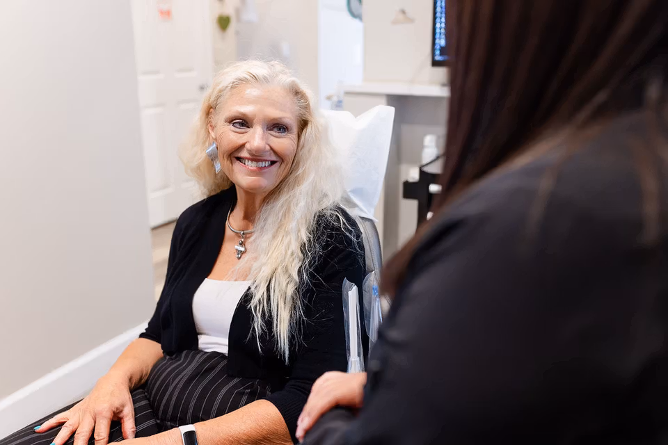 Dr. Hanson discusses digital dental images with a patient.